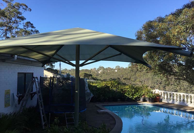 Poolside cantilever umbrella