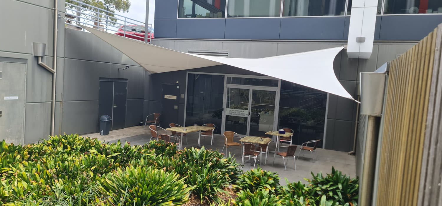 Sail over café courtyard