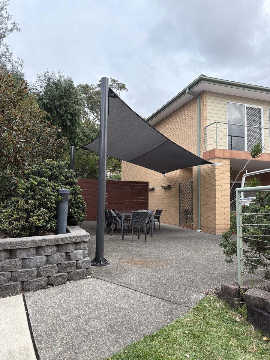 Shade sail over a home patio
